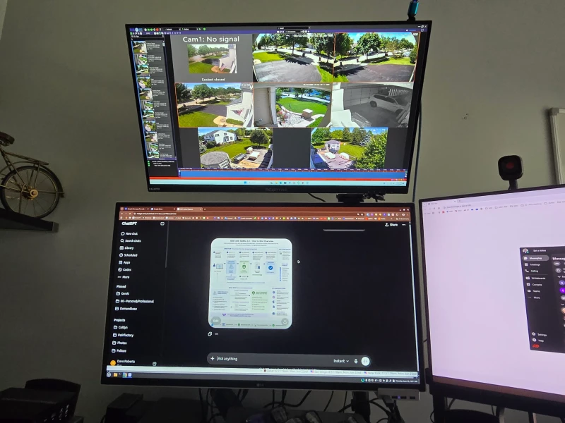 Two Intel NUCs handle separate jobs here: one for personal use, the other dedicated entirely to home video surveillance. Synergy covers both under one keyboard and mouse, while a KVM switch handles the locked-down corporate laptop that Synergy can't reach.
