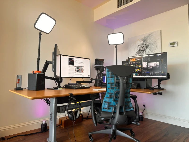 Building and developing on a Mac while the PC handles broadcast and recording, this setup keeps both roles running in parallel. Synergy carries the keyboard and mouse between them, which the owner says would be "impossibly frustrating" to manage any other way.