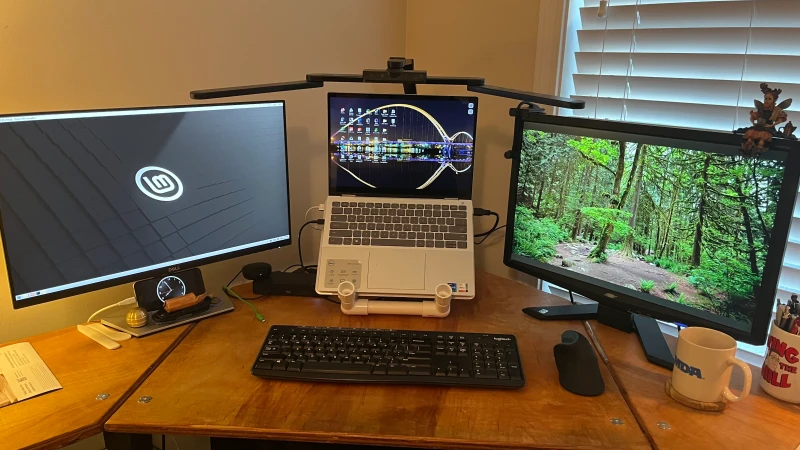 Three very different operating systems, running on hardware spanning over a decade, all controlled with one keyboard and mouse. The oldest machine, a Dell Inspiron from 2012, runs Linux Lite; the laptop handles Windows 11; and a 2015 MacBook Air covers macOS Monterey. Synergy ties it all together.