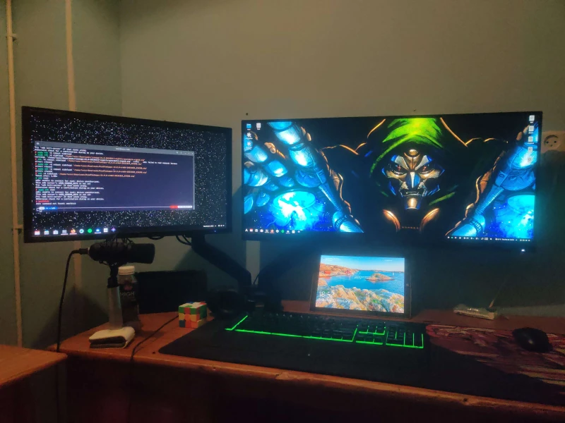 Arch Linux on the desktop handles the heavy lifting, the Surface Pro 3 covers Windows tasks, and the Steam Deck joins the shared keyboard and mouse via Synergy whenever a physical peripheral is needed quickly. Three platforms, one set of inputs.