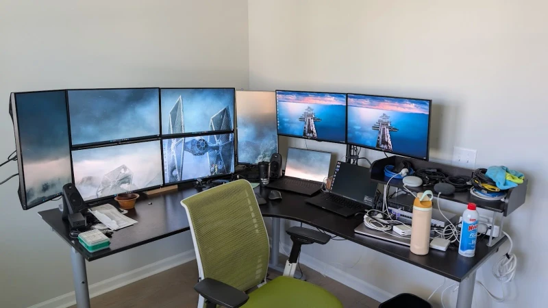 Running multiple Dell Precision laptops, a Dell OptiPlex, and assorted tablets off one keyboard and mouse keeps this corner desk from becoming a peripheral pile. The entrant also floated a good idea: Synergy support for iOS and Android would make the tablet side of things much cleaner.