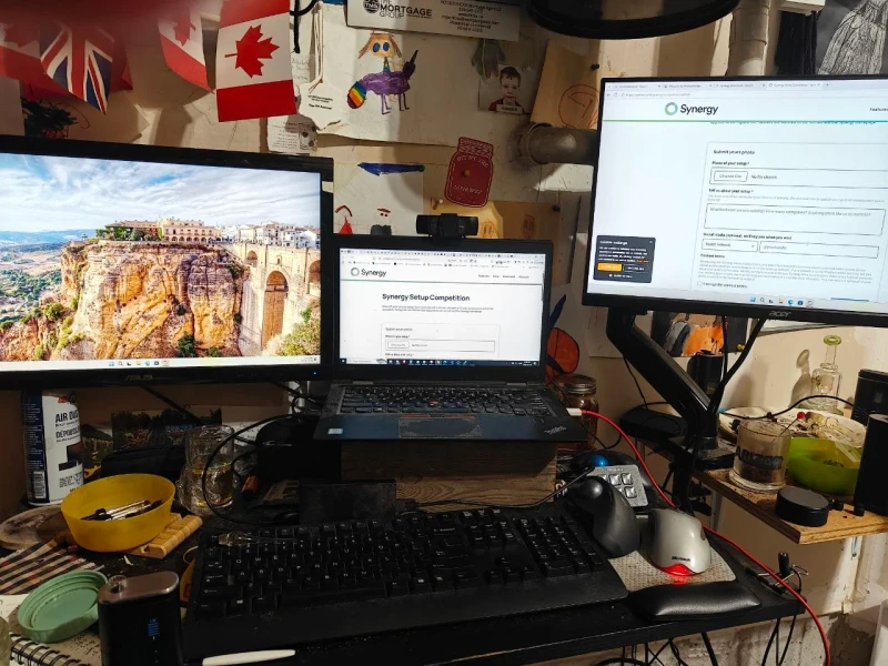 Ten years of Synergy use shows in the comfort level here. The second mouse on the desk is just a fresh-install leftover, soon to be retired once setup is complete and one input rules everything again.