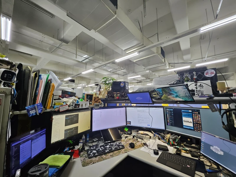 Firmware development, debugging, project management, documentation, and AI-assisted workflows all run here at once, spread across separate machines for good reason.